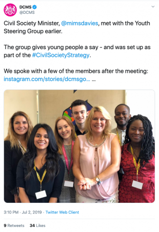 This is an image of a tweet showing the Youth Steering Group meeting with previous Civil Society Minister Mims Davis.