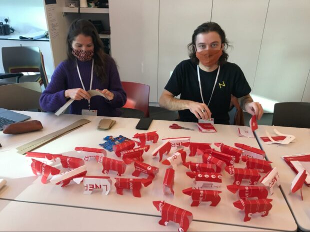 Photo of Policy Lab team preparing for their workshop at the Design Council's Design for Planet conference at the Victoria and Albert Museum in Dundee.