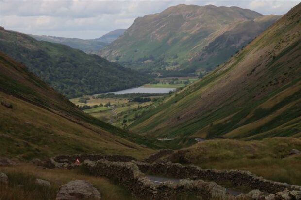 A small lake surrounded by hills